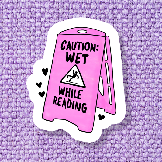 Caution: Wet While Reading Sticker