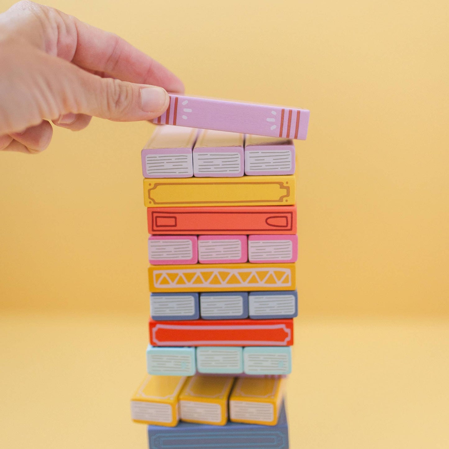 Tumbling Book Stack Game